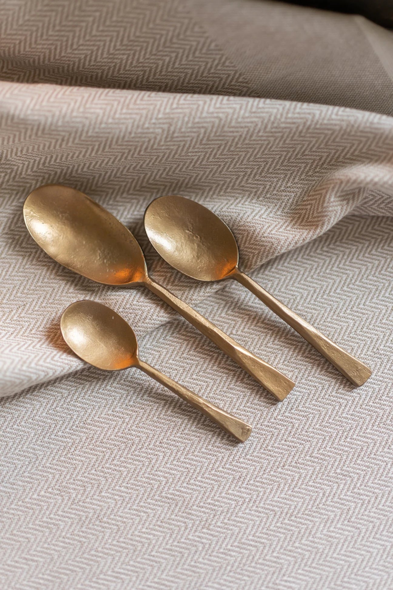 Set of Three Forged Brass Spoons